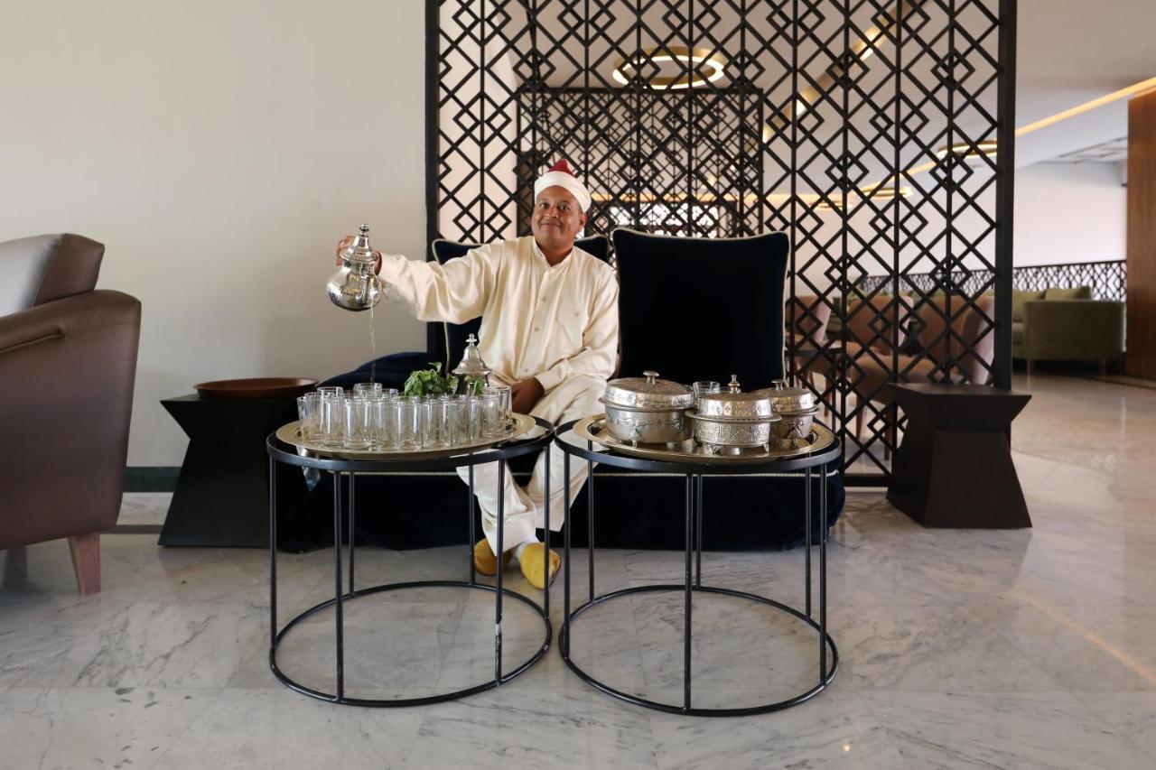 Hotel Kenzi Rose Garden Marrakesh Exterior foto A Moroccan tea ceremony