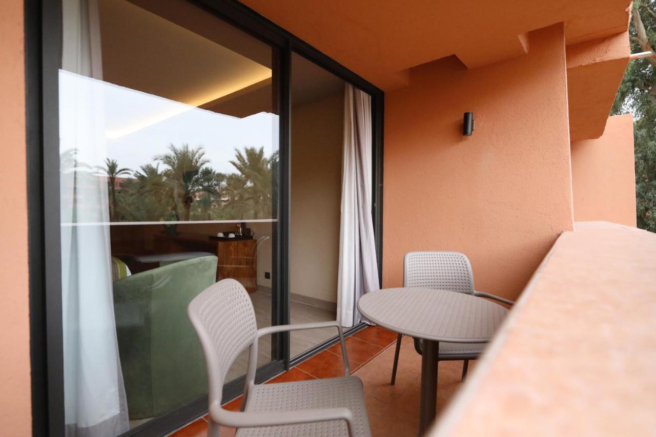 Hotel Kenzi Rose Garden Marrakesh Exterior foto A balcony at the hotel