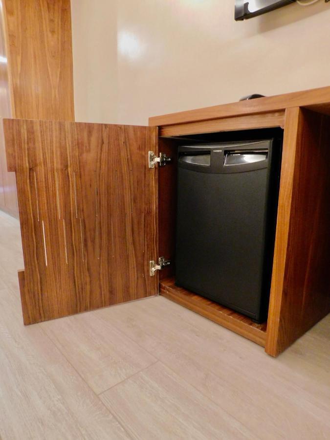 Hotel Kenzi Rose Garden Marrakesh Exterior foto A dishwasher in a cabinet